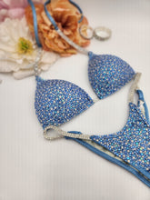 Load image into Gallery viewer, Stunning ice blue rhinestone bikini with premium blue crystals and iridescent sparkle, designed for bikini fitness and figure competitions