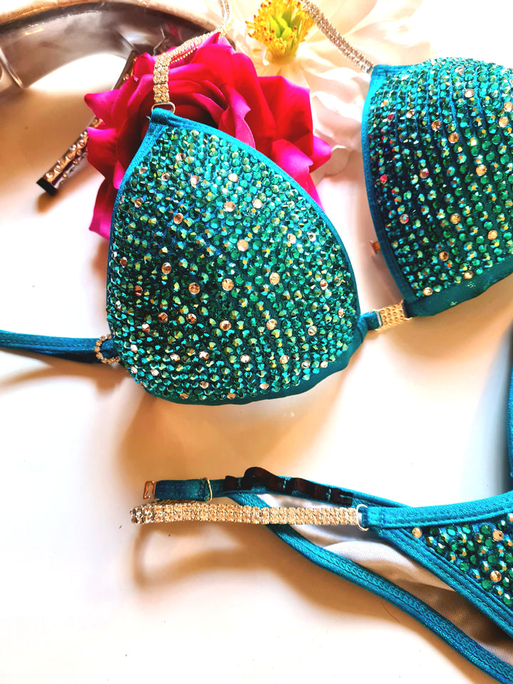 Teal green blue IFBB bikini NPC bikini swimsuit covered in preciosa crystals extra sparkly