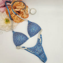 Load image into Gallery viewer, Stunning ice blue rhinestone bikini with premium blue crystals and iridescent sparkle, designed for bikini fitness and figure competitions
