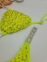 Load image into Gallery viewer, Neon green bikini with rhinestone embellishments on a light gray background
