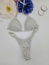 Load image into Gallery viewer, silver holographic rhinestone competition bikini covered in iridescent AB crystal

