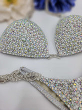 Load image into Gallery viewer, Silver holographic rhinestone competition bikini covered in iridescent AB crystal
